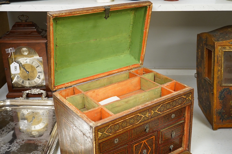 A 19th century Shiraz Eastern inlaid table cabinet, 36cm wide, 32cm high. Condition - damage to front corner edge of stringing, one side has small crack and top stringing one side missing.